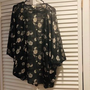 Black floral poncho 🌿